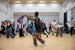 Jojo Keke teaching afro groves dance class at Bradford Arts Centre